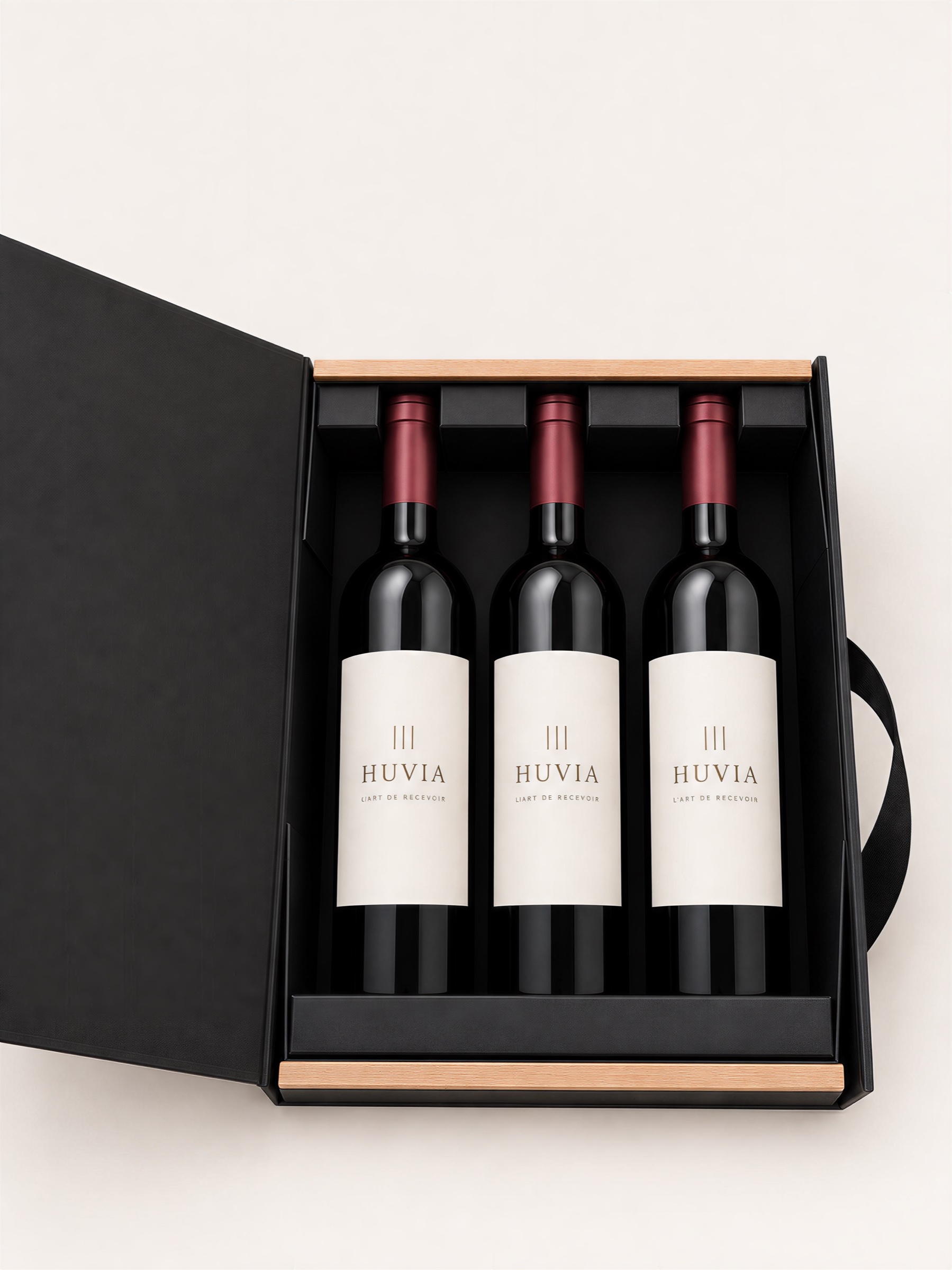 Top view showing three wine bottles held in the presentation box
